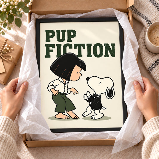 Framed display example of Pup Fiction artwork with dark green lettering and two dancing characters in a gift box.